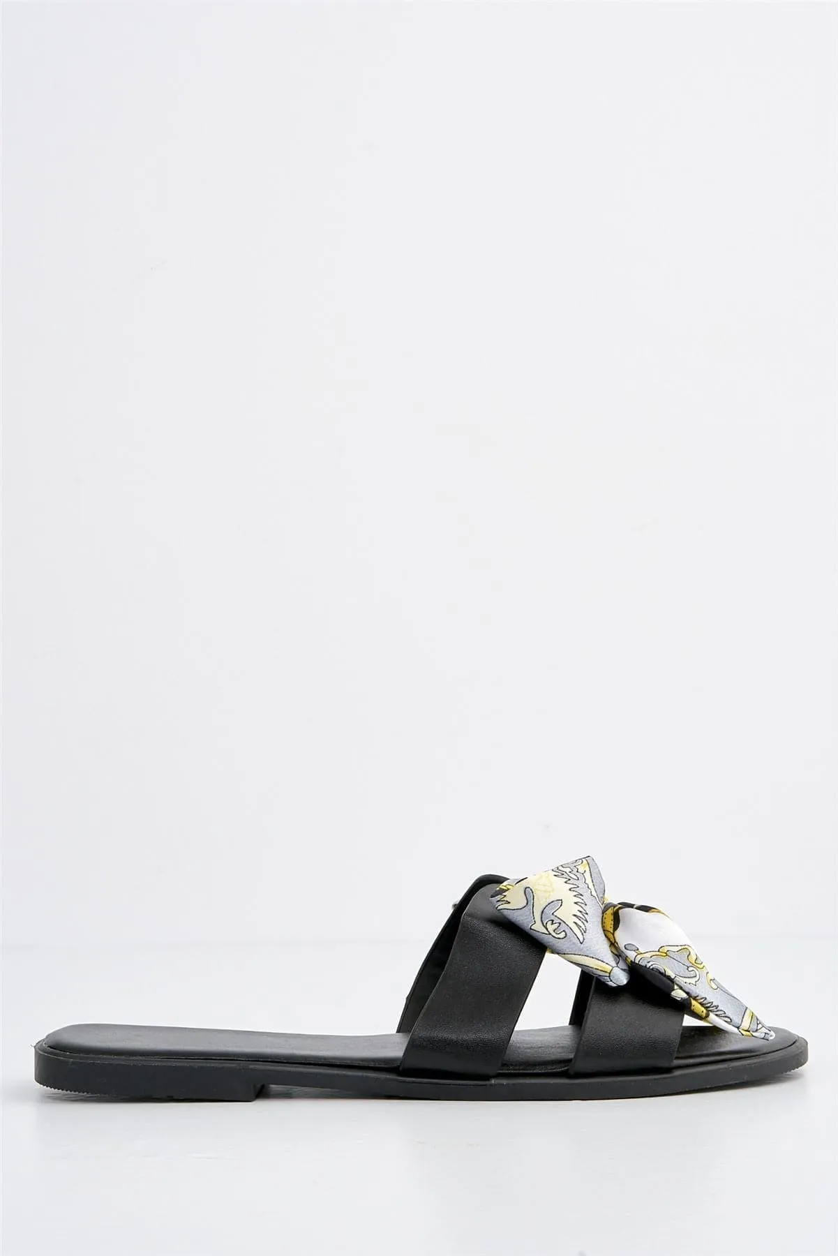 Izzy Printed Bow Flat Sandal in Black